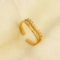 Close-up of gold double-layered open ring with wave design and white zircons - White Zirconia Style(J865-G-W)