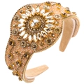 Macro detail of Baroque style padded headband with champagne gold rhinestones and gems - Brown