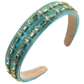 Detailed close-up of blue baroque headband with colorful crystals and gold chain edges - Blue