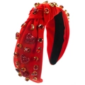 Detalle de diadema barroca roja con pedrería de corazón y diseño de nudo elegante - Corazón de Diamantes de Imitación