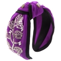 Close-up of purple knotted headband with hand-sewn pearls and silver beads detailing - Purple