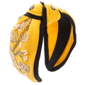 Detailed view of yellow wide knotted headband with hand-sewn pearl flower embroidery - Yellow