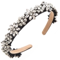 Detail shot of a floral crystal headband with sparkling rhinestones on black fabric - White