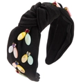 Detalle de diadema de tela negra anudada con piedras preciosas de colores y pedrería - Negro