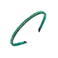 Close-up of green crystal headband with sparkling rhinestones and woven ribbon detail - Green