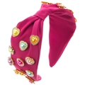Detail eines fuchsia Knotenstirnbands mit bunten Herzperlen und Strasssteinen - Rosenrot