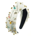 Detail van de witte geknoopte hoofdband met kleurrijke gitaarhangers en fonkelende steentjes - Wit