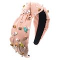 Dettaglio fascia rosa con nodo, perle, strass e ciondoli a forma di gelato - Rosa
