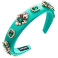 Détail d'un serre-tête rembourré turquoise avec des strass colorés de différentes formes - Vert