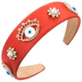 Detail of red satin headband featuring Evil Eye charms, crystals and pearl flowers - Orange Red