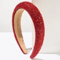 Detail of red rhinestone sponge headband featuring a soft non-slip velvet inner lining - Red