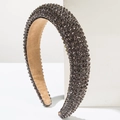 Close-up of sparkling grey crystal sponge headband with luxury rhinestone detailing - Gray