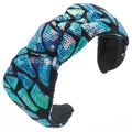 Sparkly blue sequin knotted headband with elegant geometric patterns on black fabric - Blue Gradient