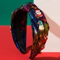 Cerchietto natalizio scintillante con motivi di Babbo Natale e tessuto colorato vivace - Rosso