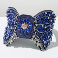 Cerchietto barocco con fiocco di cristalli blu e motivo floreale scintillante di strass - Blu