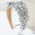 Macro detail of luxury baroque headband with floral crystals and white velvet texture - White