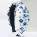 Knotted wide headband featuring exotic evil eye prints on high-quality white fabric texture - Big Blue Eye Pattern