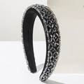 Macro shot of luxury padded headband featuring intricate grey crystal beadwork - Black