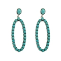 Detailed macro view of bohemian oval turquoise bead earrings with vintage silver alloy frame - Green