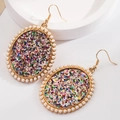 Detailed view of leopard sequins and pearls on golden oval earrings for women - Multicolor Sequins (5958725953592) / Colorful
