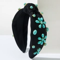 Diadema ancha con nudo vintage y patrones de flores de turquesa en pedestal blanco - Negro