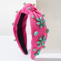 Diadema rosa con nudo decorada con piedras turquesas y detalles florales bohemios - rosa intenso