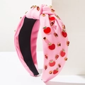 Cerchietto rosa con nodo decorato con ciondoli a mela rossa e strass brillanti - Rosa (Mela)