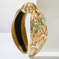 Dettaglio del cerchietto dorato con nodo, cristalli colorati e perle artificiali - Oro