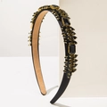 Detail of vintage headband featuring black faceted rhinestones in gold claw settings - Black