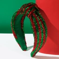 Détail du serre-tête pailleté rouge et vert avec doublure intérieure en tissu vert - Rayé