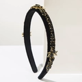 Detail of velvet headband with black rhinestones and golden bee metal ornaments - Black