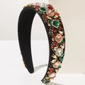 Close-up of luxury Baroque headband with colorful rhinestones and black beads on wide band - Colorful