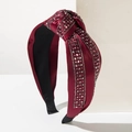 Detail view of burgundy satin knotted headband featuring elegant multi-row crystal rhinestones - Red