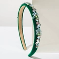 Detail of green velvet headband featuring colorful crystals and a light blue mesh bow - Green