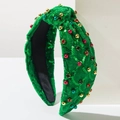 Diadema navideña de terciopelo verde con pedrería, perlas y lentejuelas en fondo blanco - Verde
