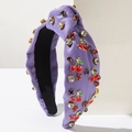 Serre-tête noeud en satin violet avec breloques cerise et strass colorés sur support - Violet