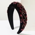 Détails de fleurs en cristal rouge sur un serre-tête en velours noir de style baroque - Rouge