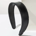 Classic black leather wide headband with elegant woven stitching on a white background - Black