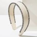 Chic beige faux leather headband with black contrast stitching for women's hair accessories - White