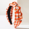 Detail of checkered headband with orange pumpkin charms and rhinestones for Thanksgiving - Pumpkin
