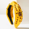 Detail of yellow Thanksgiving headband with red rhinestones and turkey ornament - Turkey