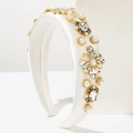 Detail of white satin headband with pearls, crystals and gold flower embellishments - Beige