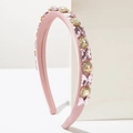Close-up of pink satin sponge headband with crystal butterflies and sparkling rhinestones - Pink
