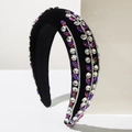 Baroque style padded headband featuring black velvet fabric and shimmering rhinestones - Purple