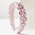 Detail of pink satin headband featuring handcrafted crystals and beaded embellishments - Pink