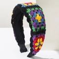 Detail of colorful granny square crochet headband with floral patterns and soft fabric lining - Iridescent Black