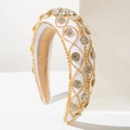 Macro shot of luxury white velvet headband with intricate gold wire and clear crystals - White