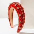 Detail of luxury baroque red velvet headband with gold floral patterns and rhinestones - Red
