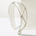 Baroque style velvet headband in ivory white featuring sparkling rhinestone chain tassels - White