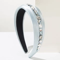 Detail of light blue satin headband with hand-sewn pearls and sparkling rhinestones - Blue
